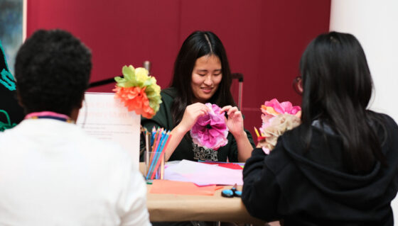 Students make paper flowers