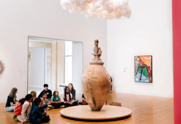 Elementary school kids engage with art during a field trip to UMMA