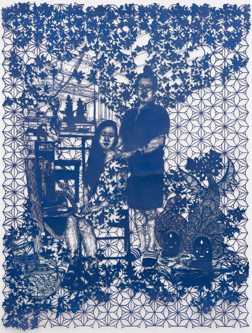 A blue sheet of paper with very intricate cutouts reveals a portrait of a woman seated in front of a man