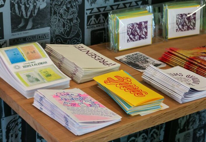 Zines placed on display tables