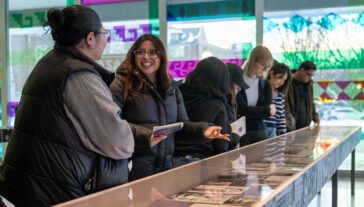 Attendees at the 'Chicanas Changing History: The First 100 Symposium' at UMMA on February 20, 2025. Including opening remarks by Dean Rosario Ceballo, a keynote lecture by U-M alum Dr. Natalia Molina, panel discussions, public receptions, an exhibition tour of La Raza Art and Media Collective, 1975 – Today, at UMMA.