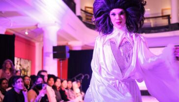 A performer on stage during UMMA's Feel Good Friday Queer Night in February 2025.