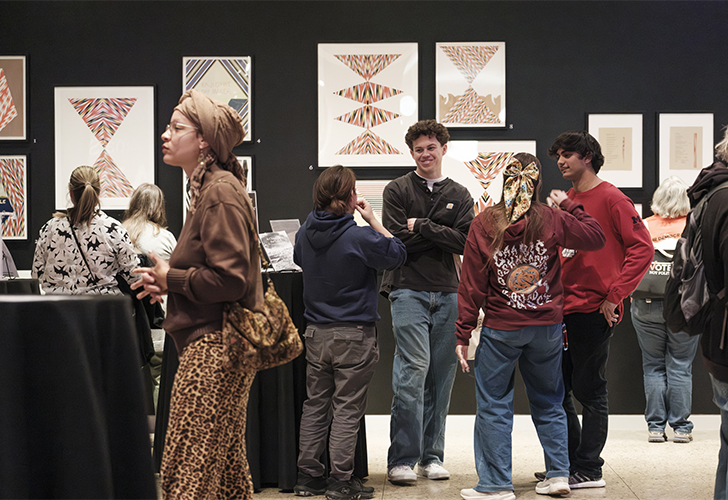 The "Feel Good Friday: Feel Good Frybread" event took place at UMMA on November 14, 2025. The night featured an artist panel on Indigenous Futurism with Andrea Carlson, Frank Waln, and Debra Yepa-Pappan; a musical performance by Frank Waln; frybread prepared by Eva and Robin Menefee of Anishnabe Meejim; book giveaways; and hands-on artmaking with Heron Hill Designs.