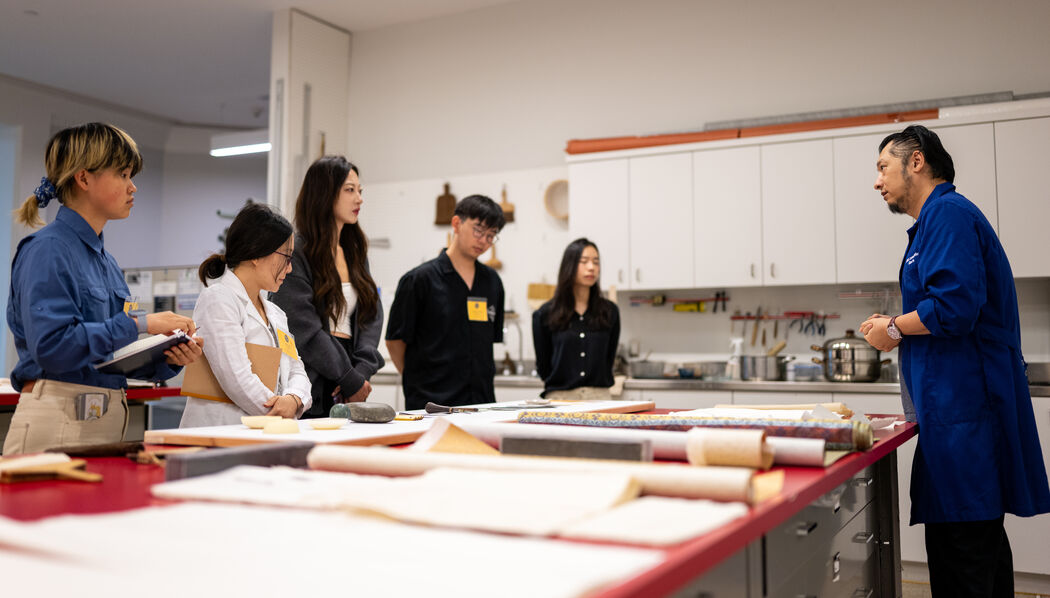 UMMA Asian Art Conservator, Qian He, leads a Conservation Lab presentation for participants of the 'Materials and Methods in Chinese Calligraphy' workshop on June 11, 2025.