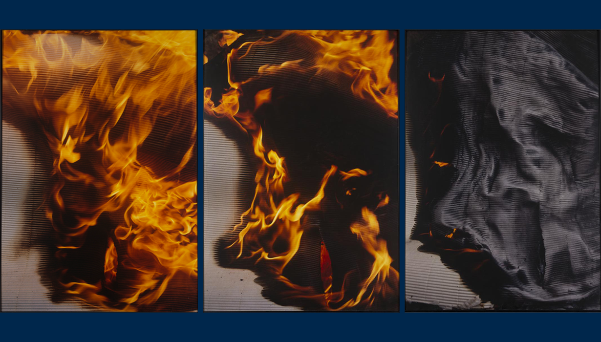 Image of flames with a gray background.