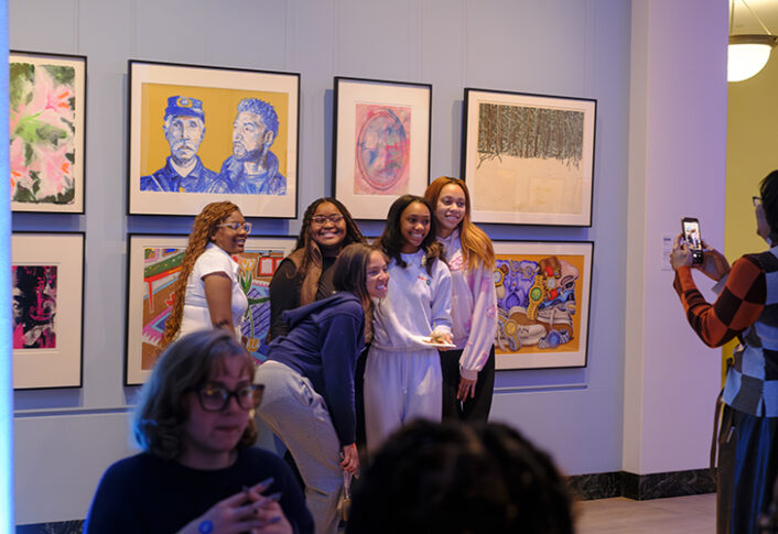 Students participate in Match Day for the "Art at Home" exhibition at UMMA, selecting original artworks from the gallery to take home for the winter semester as part of the Bridge Scholars Plus program.