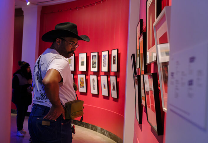 Students participate in Match Day for the "Art at Home" exhibition at UMMA, selecting original artworks from the gallery to take home for the winter semester as part of the Bridge Scholars Plus program.