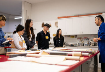 UMMA Asian Art Conservator, Qian He, leads a Conservation Lab presentation for participants of the 'Materials and Methods in Chinese Calligraphy' workshop on June 11, 2025.