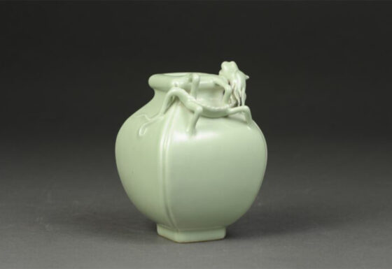 A pale green, square base, expanding at the sides sides, with a Qilin on the top portion. There is a Yongzhen reign mark.