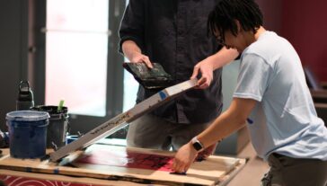 Participants learn how to create their own zines in facilitated workshops, browse community artist tables, and watch show-and-tell presentations featuring historic zine collections.