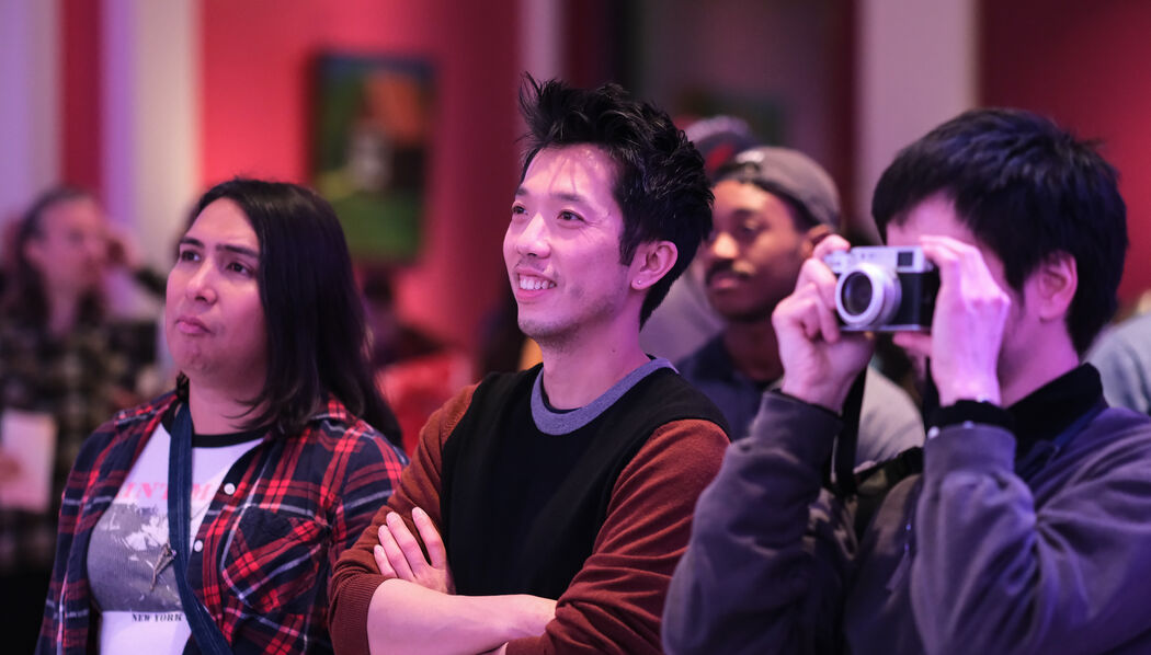 A crowd watches a performance