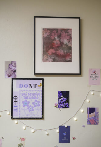 Original artworks from the Art at Home program displayed on the walls of student dorm rooms.