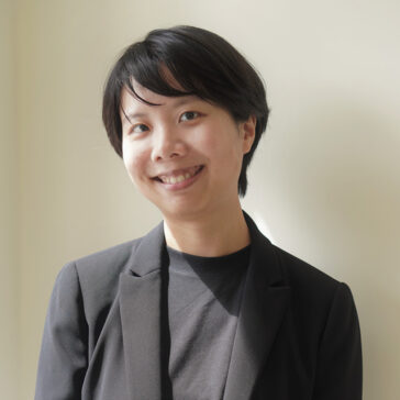 A portrait of a woman dressed in all black