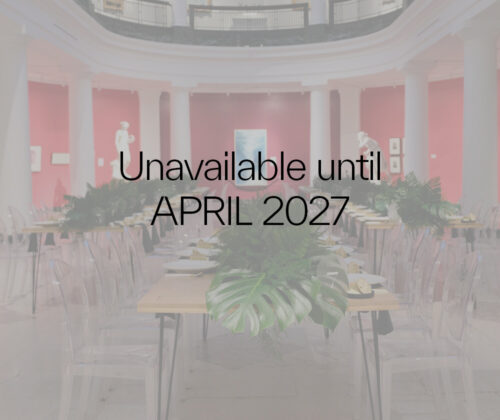 An image of a greyed out room with the text "Unavailable until April 2027"